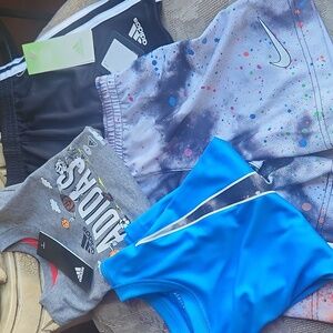 2 sets of shorts/tees